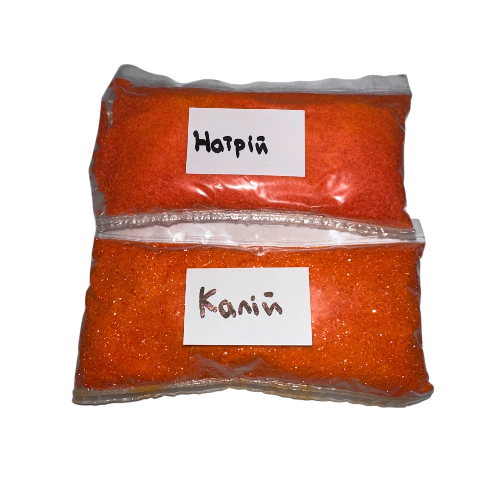 Зображення помаранчевих порошків натрію і кальцію Помаранчеві порошки натрію і кальцію | Хімреактиви